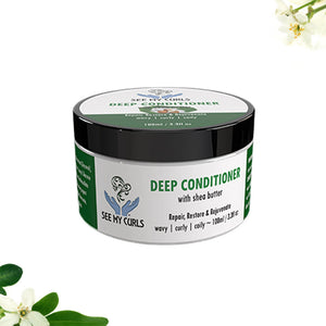 See My Curls Deep Conditioner in a 100ml (3.38 fl oz) jar. The packaging is white with green branding and a black lid, framed by white jasmine-like flowers in the corners. The label specifies it is formulated with shea butter for wavy, curly, and coily hair.