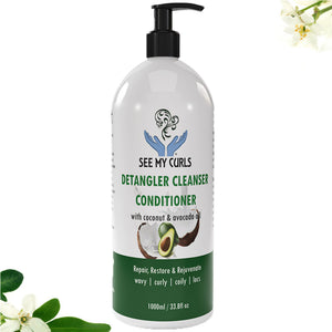 Front view of See My Curls Detangler Cleanser Conditioner 1000ml value size bottle with a black pump. Large size for wavy, curly, coily, and locs hair featuring coconut and avocado oil. Clean white background with flowers.